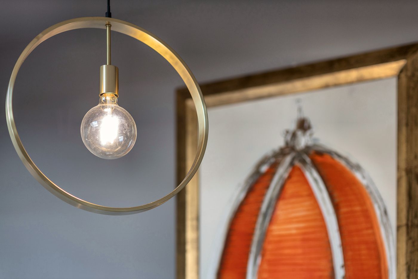 Brass pendant lamp and Duomo artwork