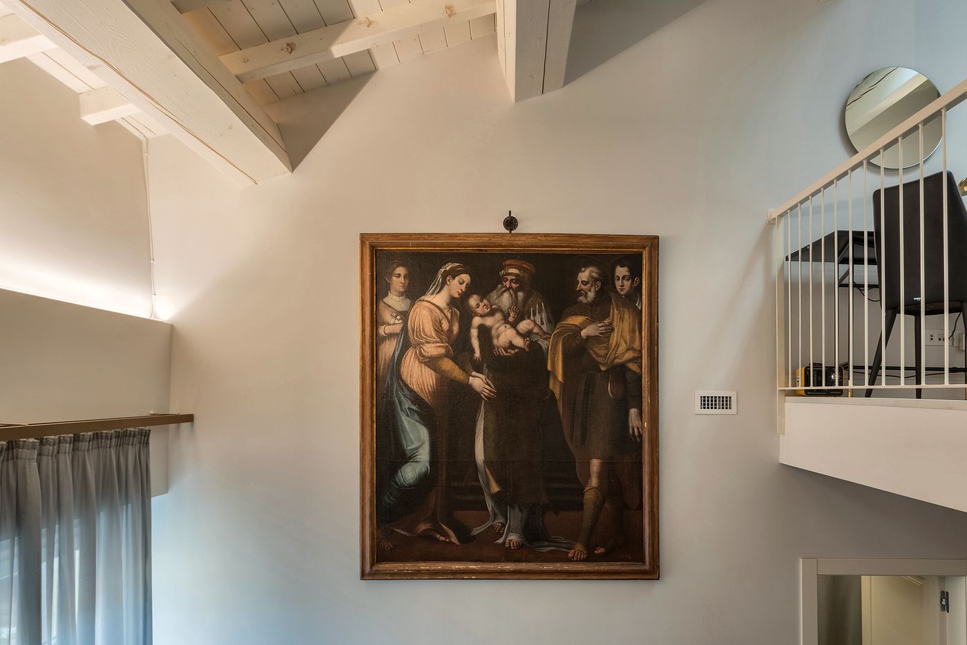 Living area with an old master painting